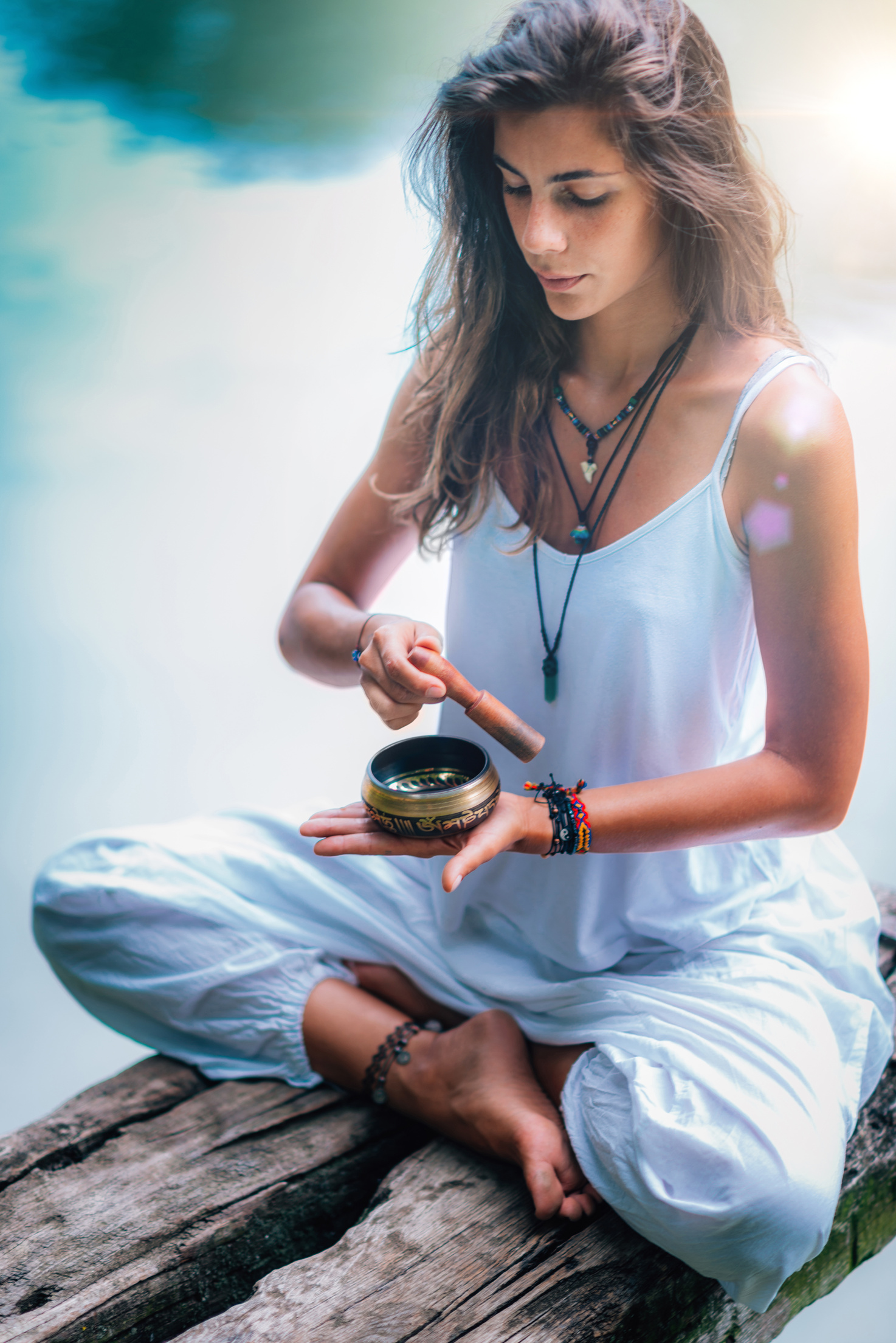 Young woman with Tibetan Singing Bowl